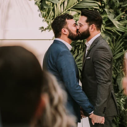 Couple kissing at their wedding