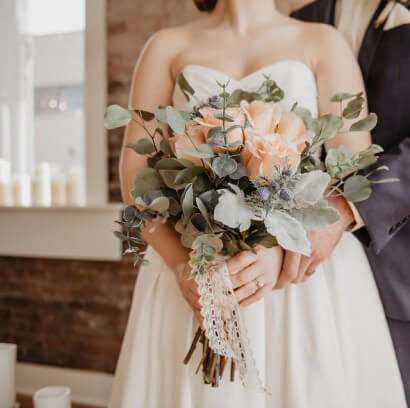 Bride holding flowers